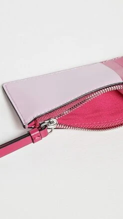 GANNI Banner Zipped Coin Purse -Jacquemus Shop ganni3187845750 1683580544481 2 0. UX357 QL90
