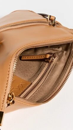 MANU Atelier Three Zipped Baguette Bag -Jacquemus Shop manua3047510734 1673458425676 2 0. UX357 QL90