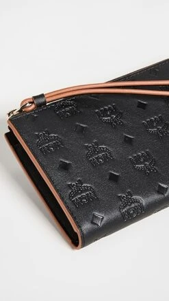 MCM Klara Monogrammed Leather Zipped Wallet -Jacquemus Shop mcmmm313251c5f0 1638481829666 2 0. UX357 QL90