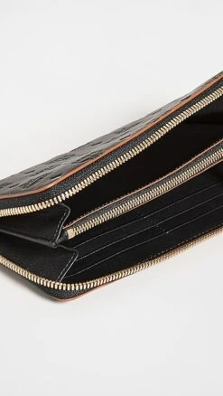 MCM Klara Monogrammed Leather Zipped Wallet -Jacquemus Shop mcmmm313251c5f0 1638481829684 2 0. UX357 QL90