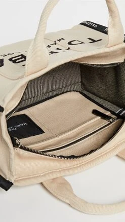 Marc Jacobs Small Traveler Tote 12 Marc Jacobs Small Traveler Tote -Jacquemus Shop mjadb3362245227 1633102409762 2 0. UX357 QL90