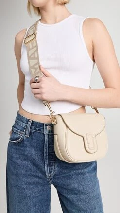 Marc Jacobs The Small Saddle Bag -Jacquemus Shop mjadb338721001f 1677439803503 2 0. UX357 QL90