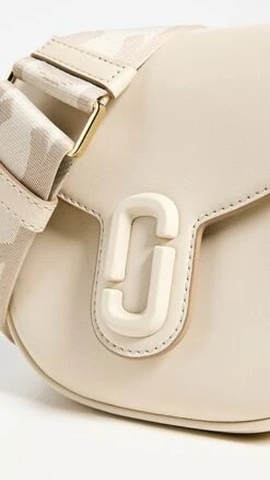 Marc Jacobs The Small Saddle Bag -Jacquemus Shop mjadb338721001f 1677439803659 2 0. UX357 QL90