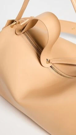 NEOUS Scorpius Leather Tote Bag -Jacquemus Shop neous30107188bf 1674769762542 2 0. UX357 QL90