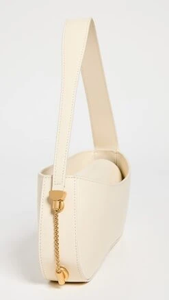 NEOUS Corvus Leather Baguette Bag -Jacquemus Shop neous3011210d92 1674852894694 2 0. UX357 QL90