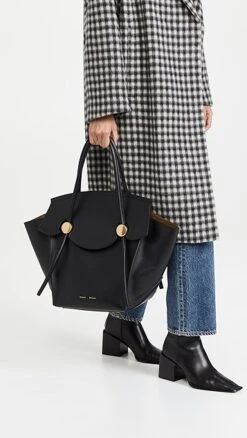 Proenza Schouler Pipe Bag -Jacquemus Shop prosh204541b002 1634826482224 2 0. UX357 QL90