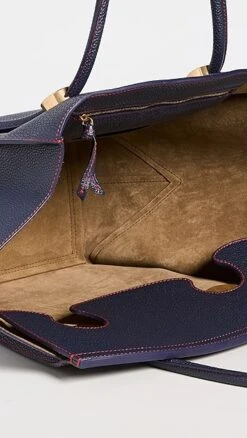 Proenza Schouler Grainy Leather Pipe Bag -Jacquemus Shop prosh20537197f0 1662654648830 2 0. UX357 QL90