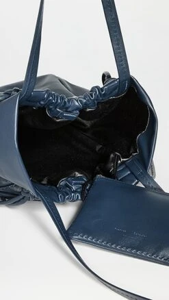 Proenza Schouler Leather Drawstring Tote -Jacquemus Shop prosh2061015d50 1672936063057 2 0. UX357 QL90