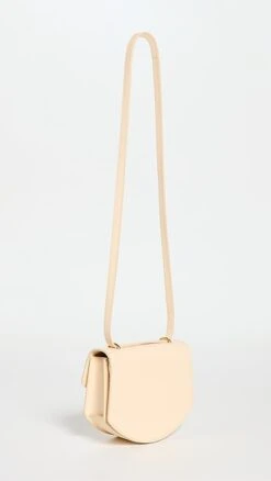 Proenza Schouler Mini Round Dia Bag -Jacquemus Shop prosh206121c026 1672953396204 2 0. UX357 QL90