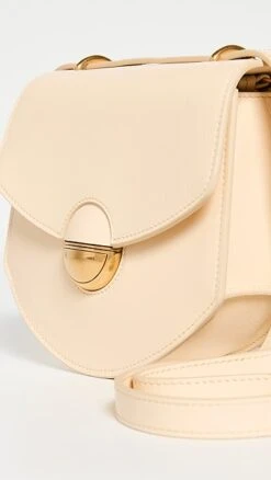 Proenza Schouler Mini Round Dia Bag -Jacquemus Shop prosh206121c026 1672953396252 2 0. UX357 QL90