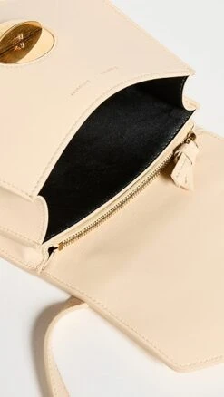 Proenza Schouler Mini Round Dia Bag -Jacquemus Shop prosh206121c026 1672953396353 2 0. UX357 QL90