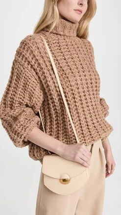 Proenza Schouler Mini Round Dia Bag -Jacquemus Shop prosh206121c026 1672953396493 2 0. UX357 QL90