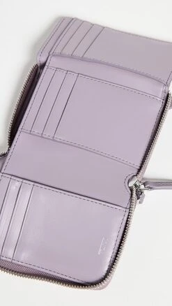 TUMI Tri-Fold Zip-Around Wallet -Jacquemus Shop tumii3138210366 1676930221752 2 0. UX357 QL90