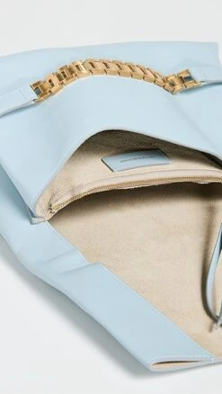 Victoria Beckham Pouch Clutch -Jacquemus Shop vbedb3025911542 1670432592424 2 0. UX357 QL90