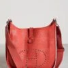 What Goes Around Comes Around Hermes Red Clemence Evelyne III Gm Bag -Jacquemus Shop wgadb36089102d9 1661972077366 2 0. UX357 QL90