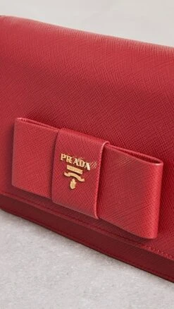 What Goes Around Comes Around Prada Red Saffiano Bow Crossbody -Jacquemus Shop wgadb36795102d9 1681151026043 2 0. UX357 QL90