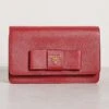 What Goes Around Comes Around Prada Red Saffiano Bow Crossbody -Jacquemus Shop wgadb36795102d9 1681151026307 2 0. UX357 QL90