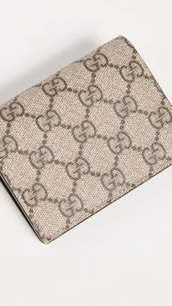 What Goes Around Comes Around Gucci Brn Coated Canvas Wallet -Jacquemus Shop wgadb368051561c 1681398283277 2 0. UX357 QL90