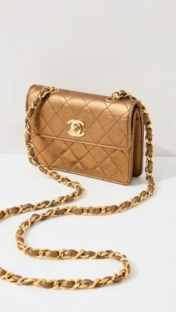 What Goes Around Comes Around Chanel Gold Half Flap Micro Bag