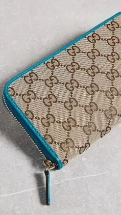 What Goes Around Comes Around Gucci Blue Canvas Ab Zip-Around Wallet -Jacquemus Shop wgadb36841102c9 1681999285888 2 0. UX357 QL90