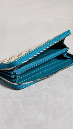 What Goes Around Comes Around Gucci Blue Canvas Ab Zip-Around Wallet -Jacquemus Shop wgadb36841102c9 1681999286938 2 0. UX357 QL90