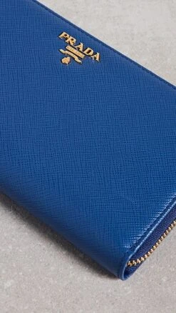What Goes Around Comes Around Prada Blue Saffiano Zip Around Wallet -Jacquemus Shop wgadb36927102c9 1684252539750 2 0. UX357 QL90
