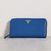 What Goes Around Comes Around Prada Blue Saffiano Zip Around Wallet -Jacquemus Shop wgadb36927102c9 1684523450140 2 0. UX357 QL90