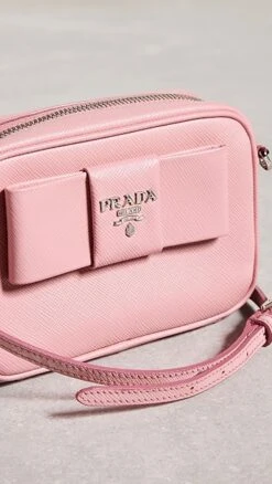What Goes Around Comes Around Prada Pink Saffiano Bow Crossbody -Jacquemus Shop wgadb3696111de9 1684268614903 2 0. UX357 QL90
